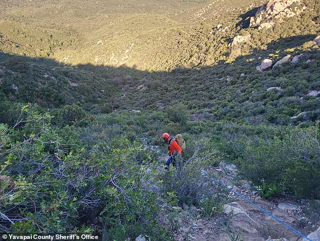 Due to the terrain and darkness, deputies with the Yavapai County Sheriff's Office had to wait all night to recover her body, never leaving her side.