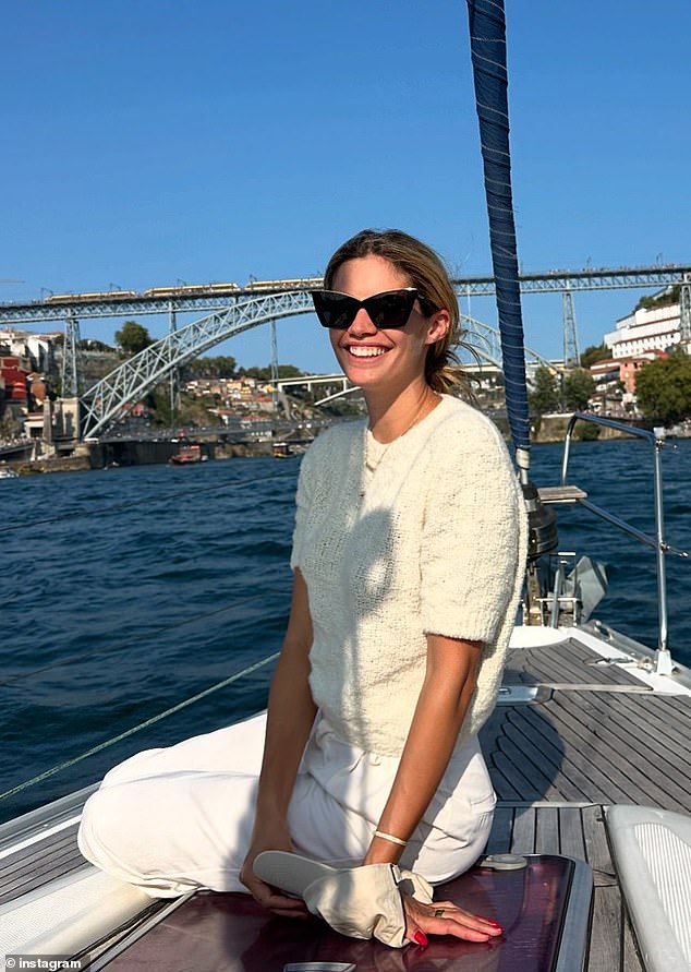 Sara smiled brightly during a beautiful boat trip through Porto, Portugal