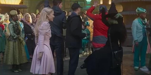 Some fans are convinced they spotted Kristin Chenoweth, who played Glinda in the first-ever stage adaptation of the story at the George Gershwin Theatre in 2003-2004, in the background of a scene, just behind Grande, captured at 1:54 of the new featurette.