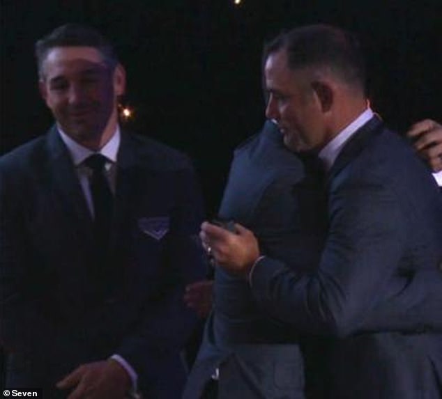 Football fans were delighted to see Smith and Cronk embrace (pictured) after their bitter feud in 2017 when the halfback left Melbourne to join the Roosters