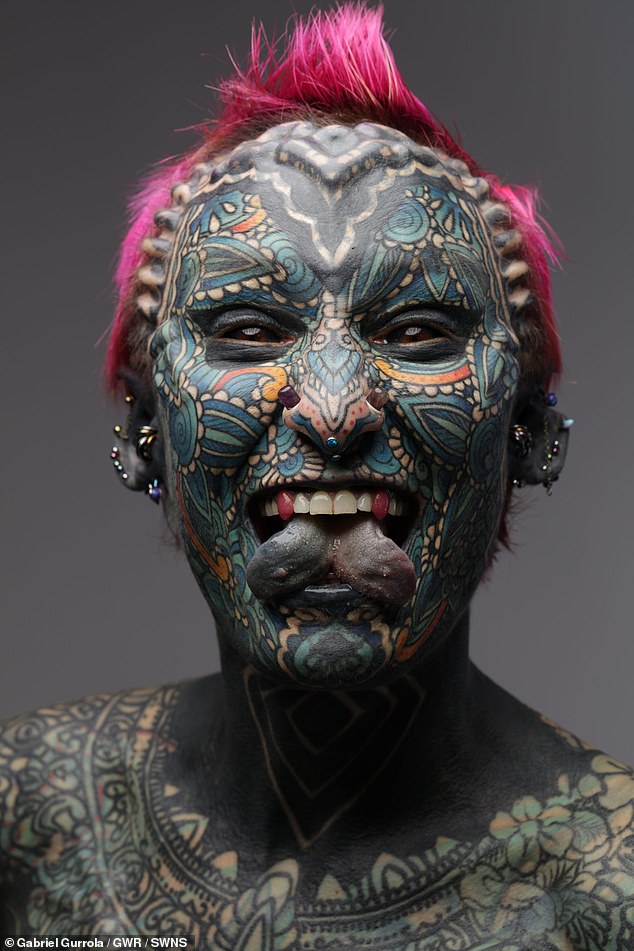 The veteran - who got her first tattoo on her hip when she was 21 - also holds the Guinness World Record for most body modifications on a woman