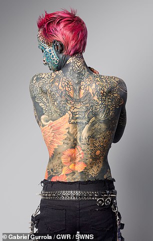 Now her tattoos stretch from her scalp to the soles of her feet - including her eyelids, eyeballs, gums and tongue