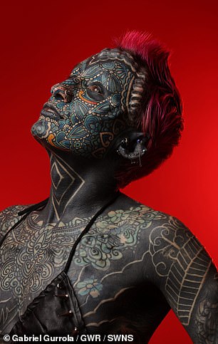 The first body modification Esperance underwent was a 'tongue split' and she subsequently had five facial implants and a wide range of piercings in her ears, nipples, labia and gums.