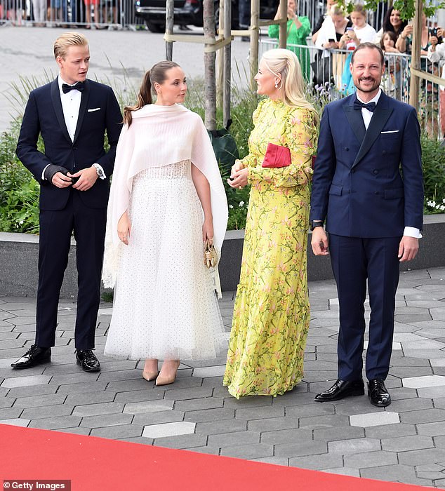 Marius Borg Høiby, 27, (left) spent more than 30 hours in custody after an incident at an apartment in Frogner, Oslo - where a woman in her 20s called police earlier this month (pictured with Princess Ingrid Alexandra, Crown Prince Haakon and the Crown Princess in 2022)