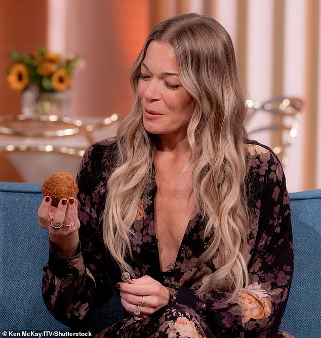 Joel has to give LeAnn a glass of water after she nearly chokes on the dry scotch egg. Shortly after, she has to try the Bovril, which Rochelle described as: 'It's like watered down beef'