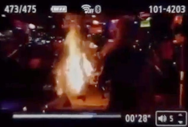 The 28-year-old's skirt suddenly caught fire, engulfing her in flames as shocked witnesses looked on