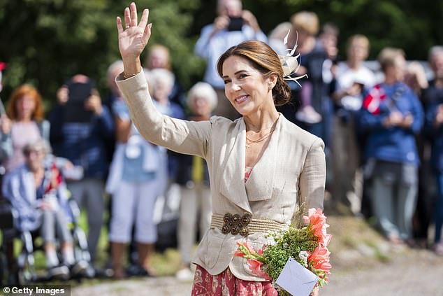 The Australian-born monarch stepped foot in Assens with her husband King Frederik on Wednesday as part of the couple's summer tour on the royal yacht Dannebrog