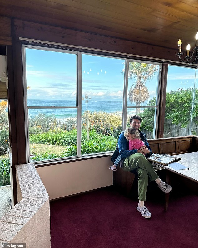 The dilapidated house is 746 square metres in size and is surrounded by large glass windows, offering expansive views of Racecourse Beach below