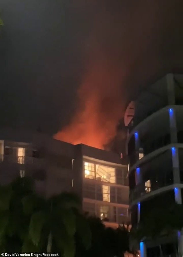 Emergency services were called to the Double Tree Hotel by Hilton in Cairns after a helicopter crashed into the roof of the building, causing a massive fire