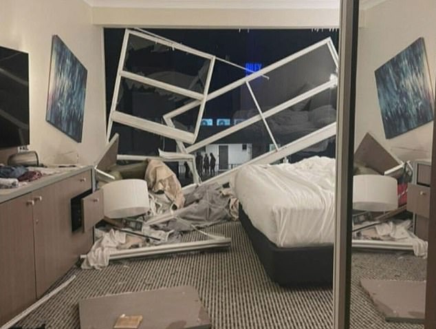 The helicopter hit the roof of the luxury Cairns hotel - knocking off two of its propellers on impact. The photo shows one of the damaged rooms on the top floor