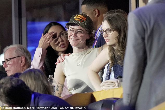 Ella Emhoff wears a Harris-Walz hat during the first day of the Democratic National Convention