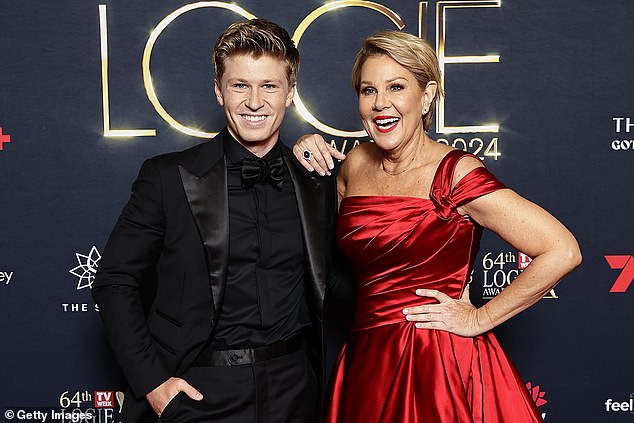 The reality TV star shocked fans on Sunday when he turned up at the Logie Awards with a very surprising date - his I'm A Celebrity... Get Me Out of Here co-host Julia Morris. Both pictured