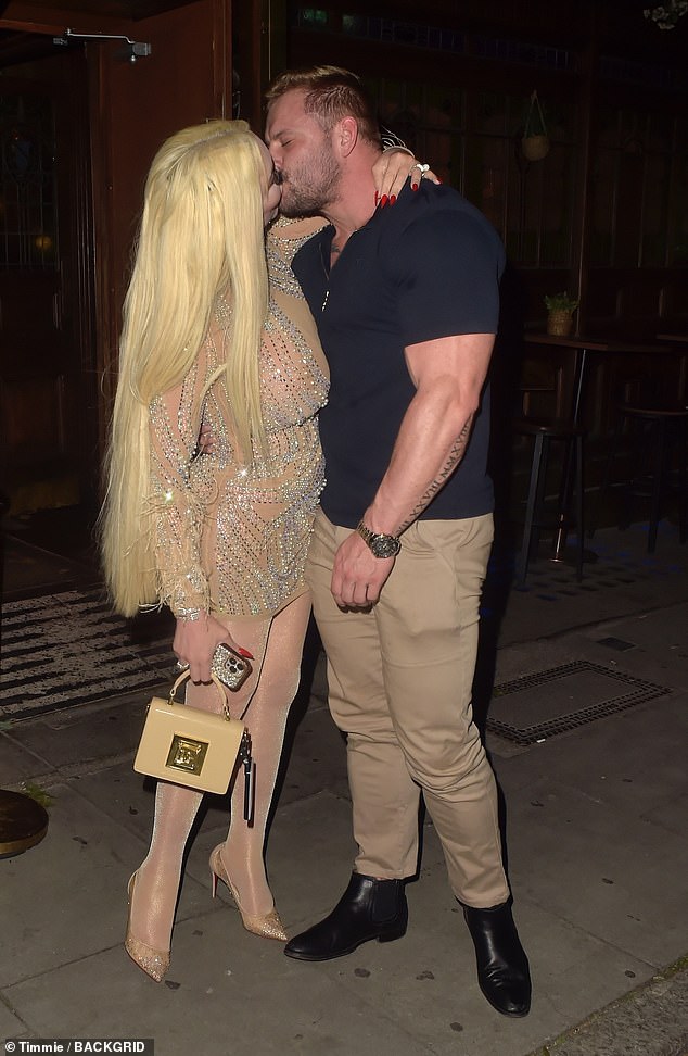 The 41-year-old TV personality looked as glamorous as ever in a semi-sheer mesh minidress for a night out at the Sican Restaurant on Tottenham Court Road