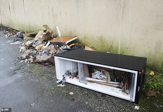 A dirty refrigerator was dumped outside the wedding venue where the first wedding was held in March