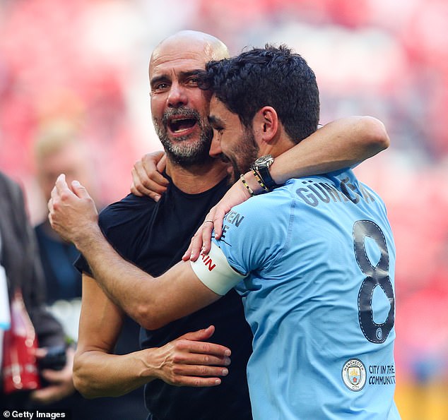 Gundogan (right) will now reunite with Pep Guardiola (left) at City, after just a year away from the club