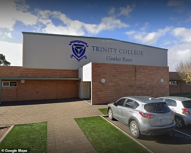 The former teacher was working at Trinity College in Gawler, 42km north of Adelaide's CBD, when he was arrested (pictured is the private primary and secondary school).