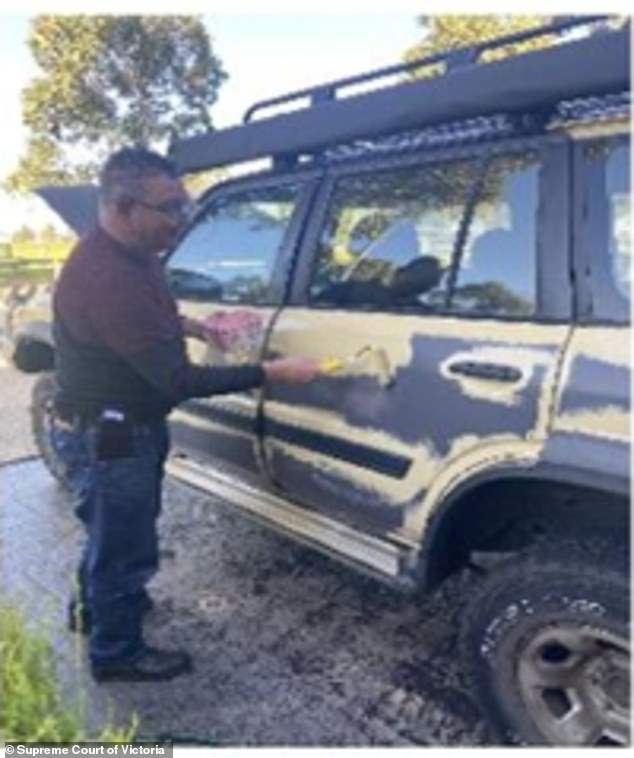 Lynn paints over his 'murder van' outside his Caroline Springs home after killing Carol Clay