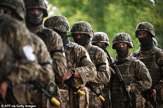 Ukrainian soldiers take part in a casualty simulation exercise conducted by the British Armed Forces, as part of the Interflex programme, in the south of England, on August 22, 2024