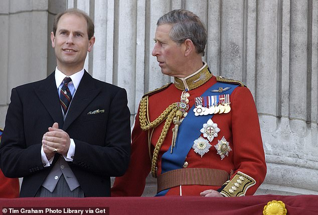 Prince Edward talks to Charles on the balcony of Buckingham Palace in 2003