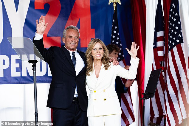 Robert F. Kennedy Jr. (left) and his wife Cheryl Hines (right) at his independent presidential campaign launch in Philadelphia in October