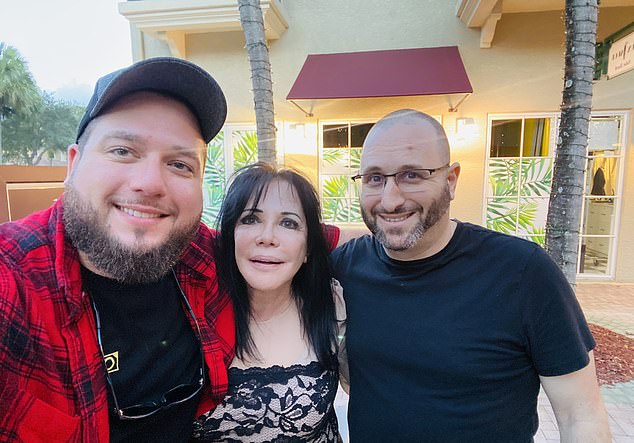 Mrs. Keller is pictured before her surgery with her two sons