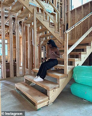 Simone Biles poses in her new home