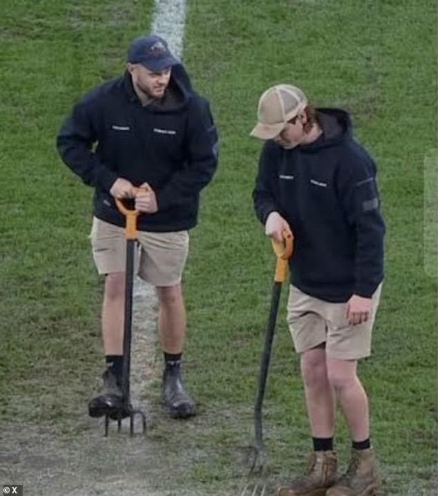 The ground crew tried to drain some of the water during half-time using pitchforks