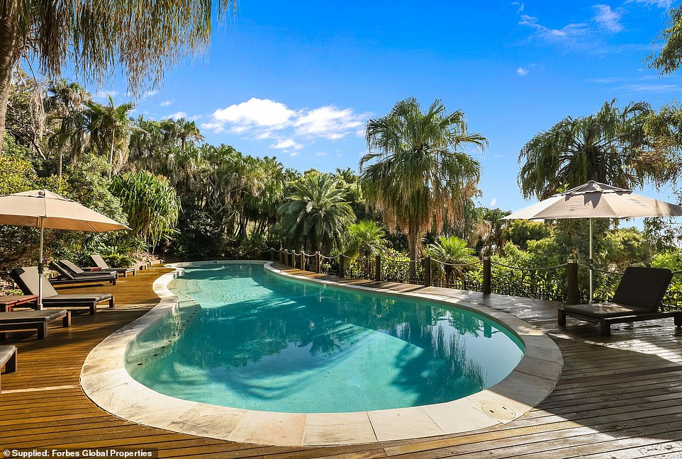 Five homes on the estate share Honeymoon Bay, a 30-meter saltwater pool, a cozy cabana with barbecue facilities, a tennis court and a full-time manager