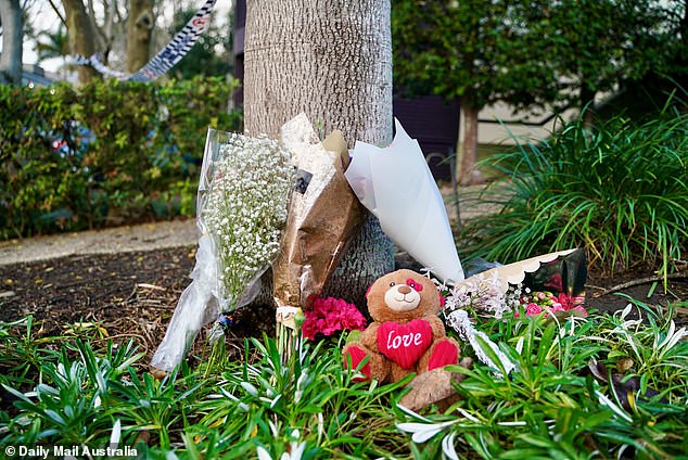 Sophie's classmates lay wreaths and flowers to mourn the death of the fifth grade student