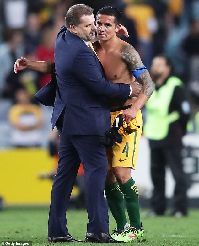 Ange Postecoglou also coached Australia at the 2014 World Cup and led the Socceroos to qualification for the 2018 World Cup in Russia (pictured with Tim Cahill)