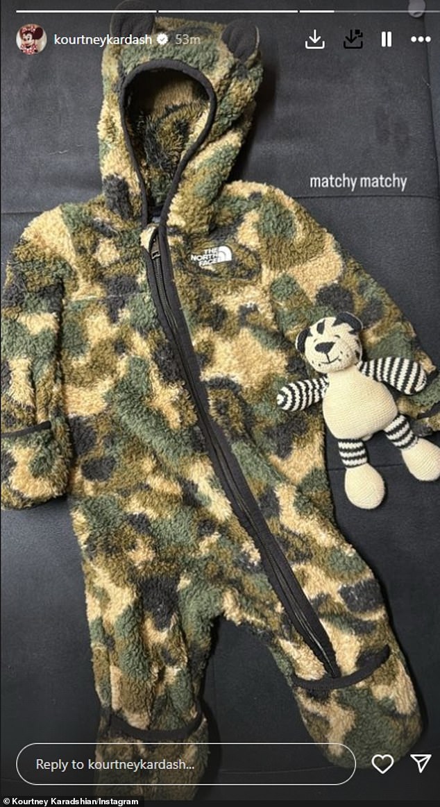 Kourtney took to Instagram to show off a fuzzy babygrow for the little one, writing, 