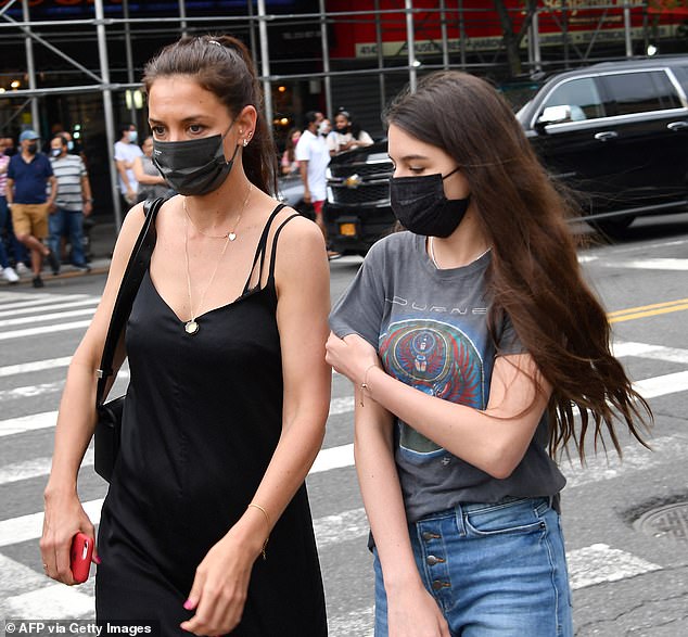 Holmes and Suri arrive at the In The Heights premiere during the 2021 Tribeca Festival at the United Palace Theatre in New York City