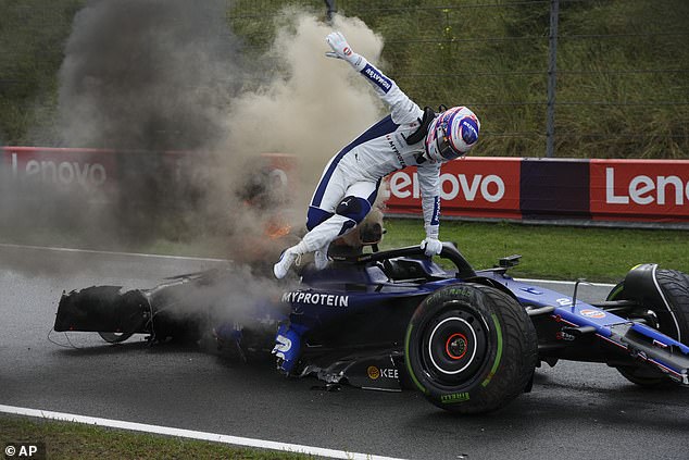 The American driver immediately jumped out of the car after being told his car was on fire