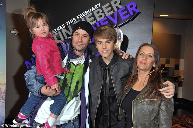 Despite not seeing his father much while growing up, the couple later reconnected and now have a positive relationship (pictured in 2011 with his mother Pattie and half-sister Jazmyn)