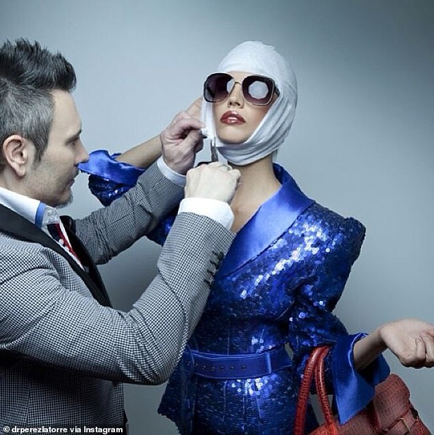 Other promotional photos showed him using fake bandages on models after the 'surgery'