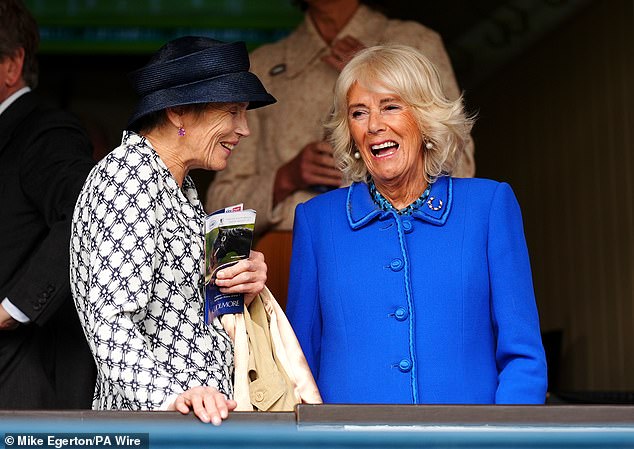 Camilla's brooch is also decorated with letters that spell out the name 'Minoru', one of King Edward VII's most successful horses.