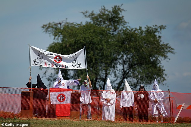 A member of the Confederate White Knights speaks during a rally at the Antietam National Battlefield on September 7, 2013 near Sharpsburg, Maryland