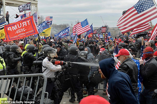 Moore issued a dire warning, writing that he, more than anyone, understands how divided America is, and identifies former President Donald Trump as an instigator of that division. He believes there is a throughline between white supremacists and January 6, pictured above