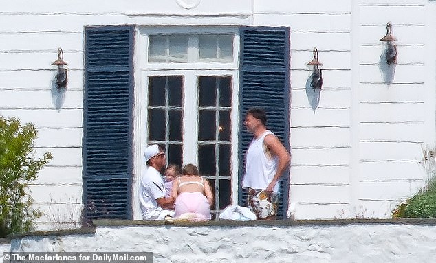 Travis and Taylor were spotted chatting with Bronze - Patrick and Brittany's youngest child