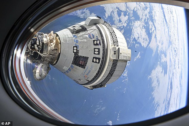 Pictured: Boeing's Starliner spacecraft, which suffered serious problems during its launch into orbit, docks outside the space station on July 3, 2024.