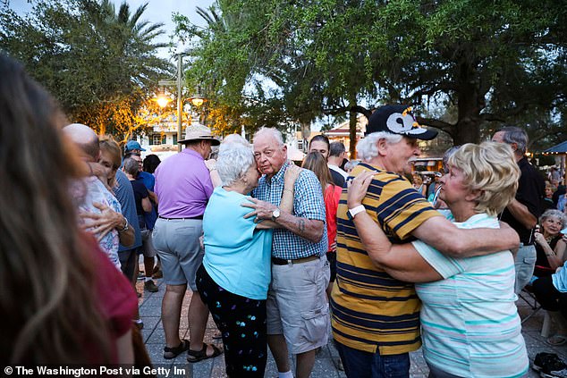 Pictured: A group of seniors dancing during a concert in The Villages