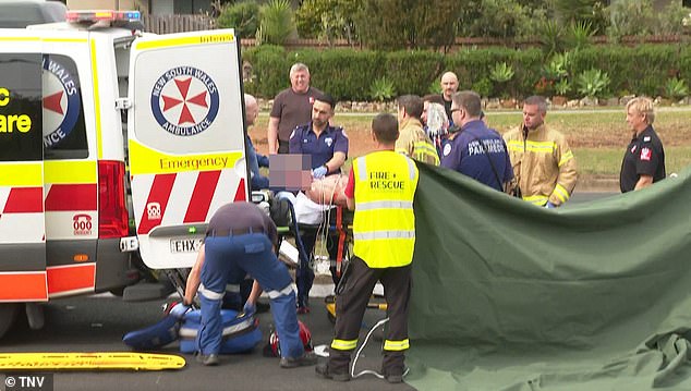 A 40-year-old woman is among the passengers rushed to St. George Hospital (paramedics are pictured treating an injured passenger at the scene)