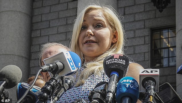 Virginia Roberts Giuffre speaks to the press outside a Manhattan courthouse in 2019 following the death of Jeffrey Epstein in his cell