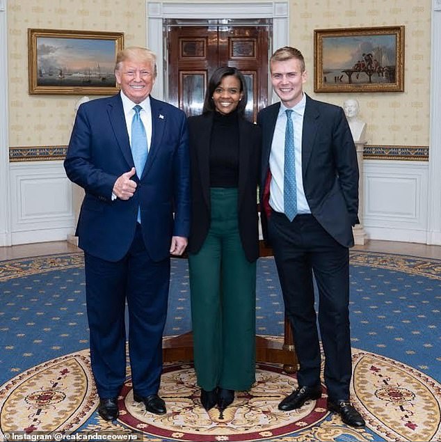 Mrs. Owens (center) poses for a photo with former US President Donald Trump (left) and her husband George Farmer (right)