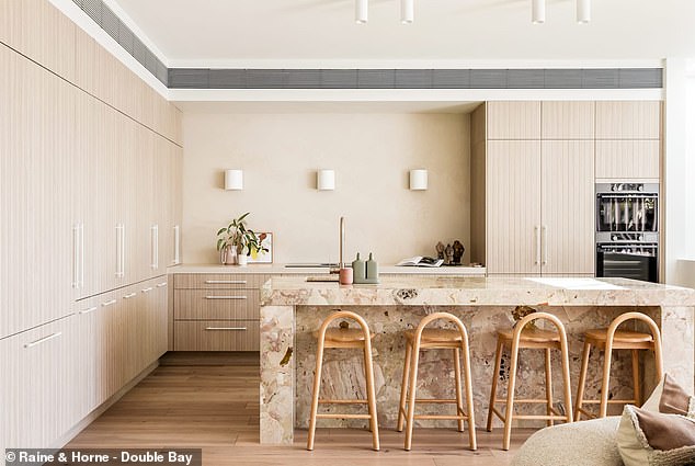 The four-bedroom, four-bathroom home is located just 400 metres from Australia's most famous beach and has undergone many transformations, Domain reports