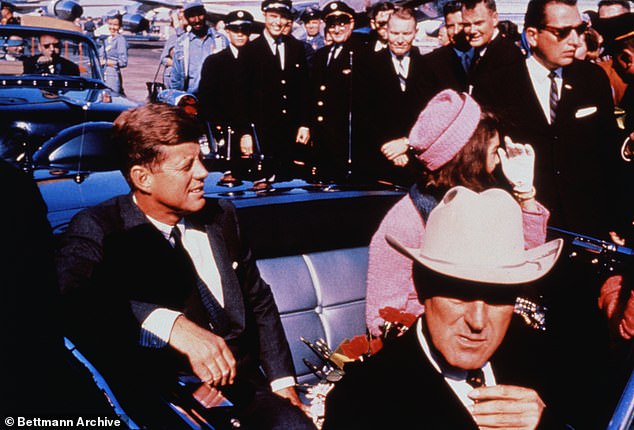 For years, many have questioned the official story of what happened in Dallas on November 22, 1963. JFK and Jackie Kennedy are pictured moments before he was assassinated.