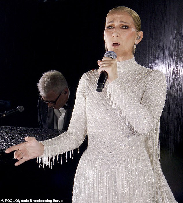 Music legend Celine Dion performs on the Eiffel Tower during the opening ceremony of the Paris 2024 Olympic Games