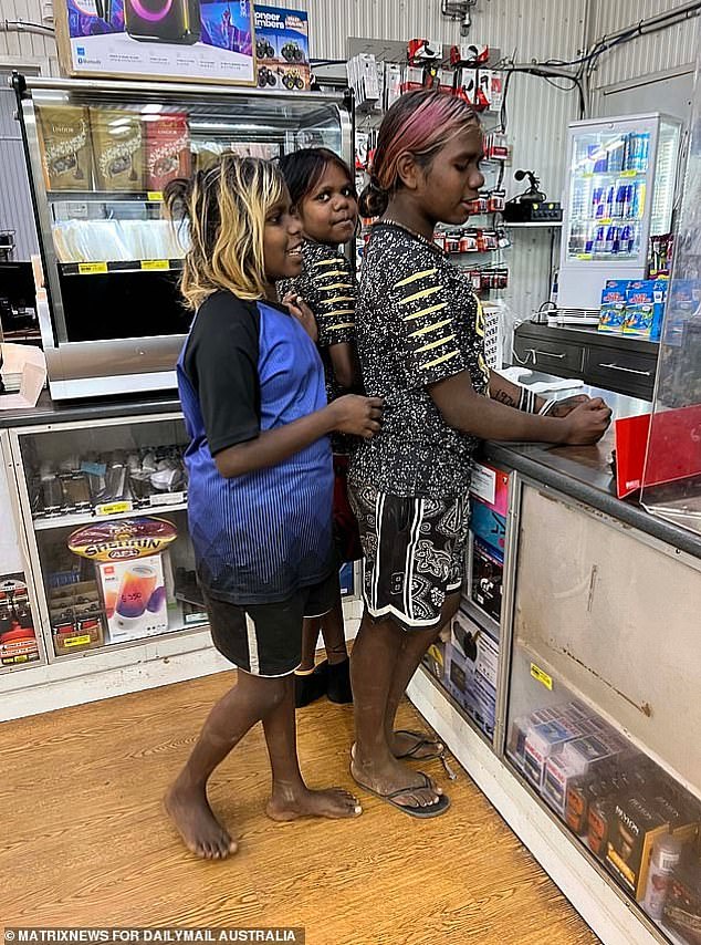 Warnings about indigenous people taking white people's homes and property is 'scaremongering' and 'has never happened and never will happen'. Above, girls at Pukatja Roadhouse, 450km south of Alice Springs