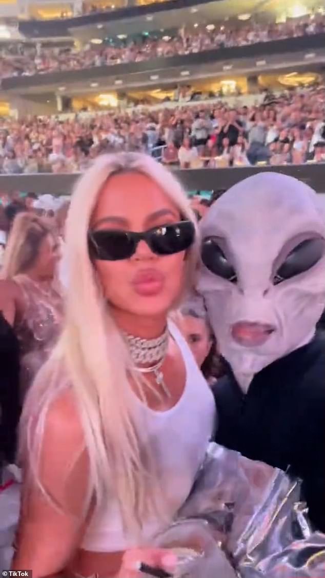 The BLM protester is best known as the 'Alien Superstar' who 'emptied his savings account' by spending 'five figures' to attend eight Beyoncé Renaissance Tour concerts while wearing a prosthetic head (pictured with Khloe Kardashian)