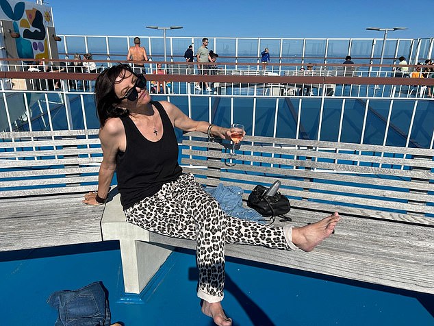 Mrs Sturgis, a PA for a pharmaceutical company, can be seen relaxing on the ship before her incident